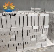 What are the causes of waste products when forming clay bricks?